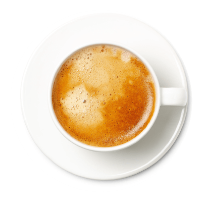 "Top-down view of a white cup of Puro coffee with foam, on a slightly larger white saucer, set against a white background."